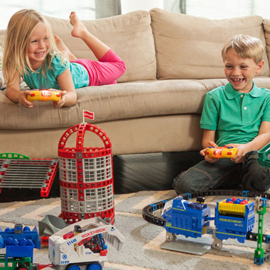 2 children playing with Rokenbok